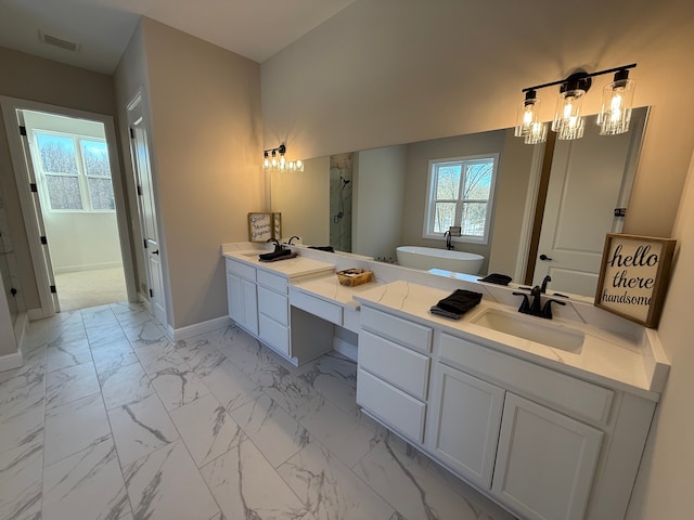 full bathroom with double vanity, a stall shower, baseboards, marble finish floor, and a sink