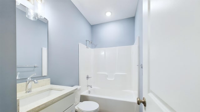 full bath featuring vanity, toilet, and shower / bathtub combination