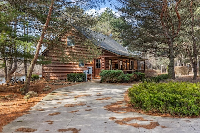 view of home's exterior featuring a porch