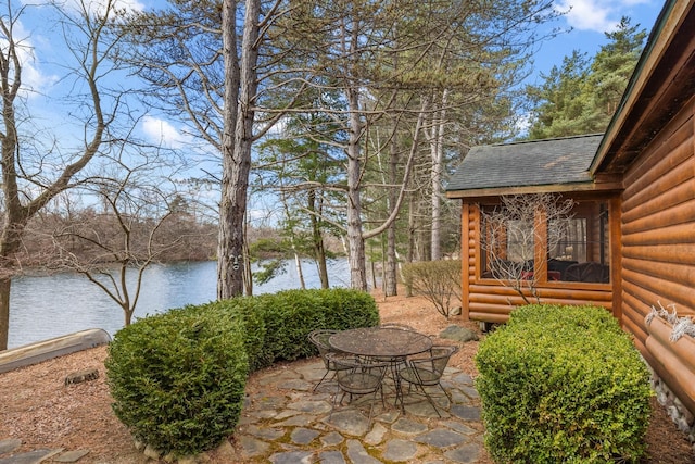 view of patio / terrace with a water view