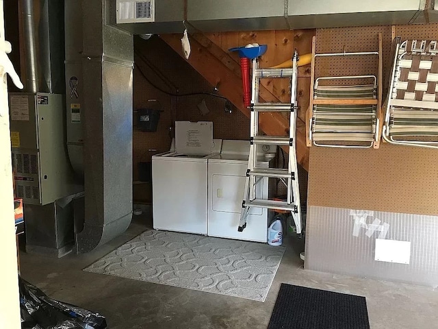 laundry room with washer and dryer