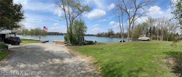 exterior space with a water view