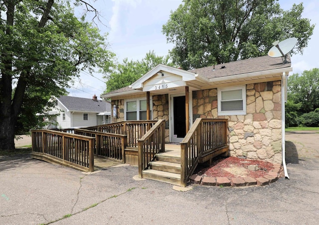 view of front facade with a deck