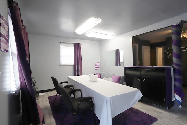 dining area featuring light wood-type flooring