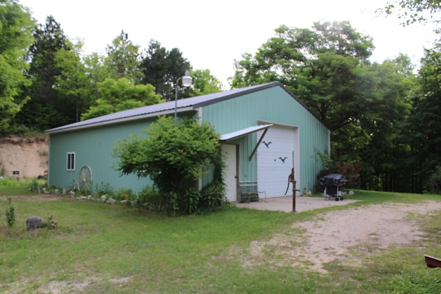 2802 Coulter Creek Trl, Central Lake, MI 49622 - exterior space featuring a yard