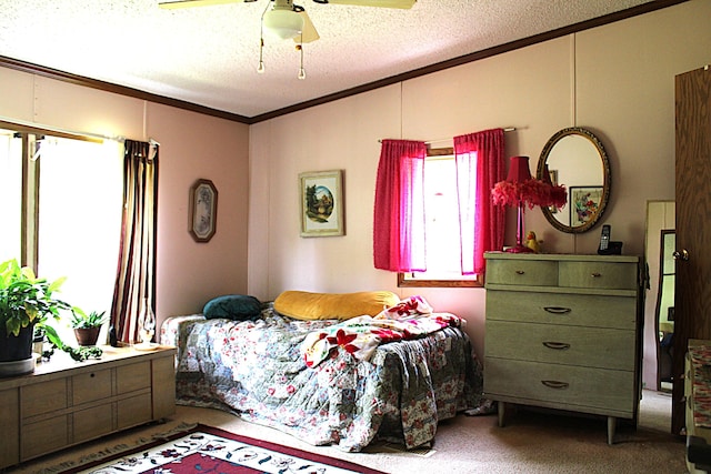 2802 Coulter Creek Trl, Central Lake, MI 49622 - carpeted bedroom with a textured ceiling, ceiling fan, and ornamental molding