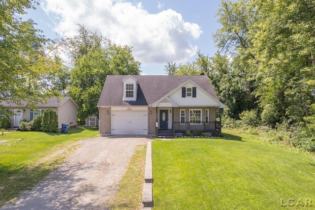 12171 Grandview Dr, Jerome, MI 49249 - cape cod house with a porch, dirt driveway, a front yard, and a garage