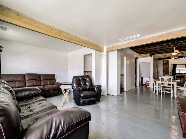 living room with beam ceiling