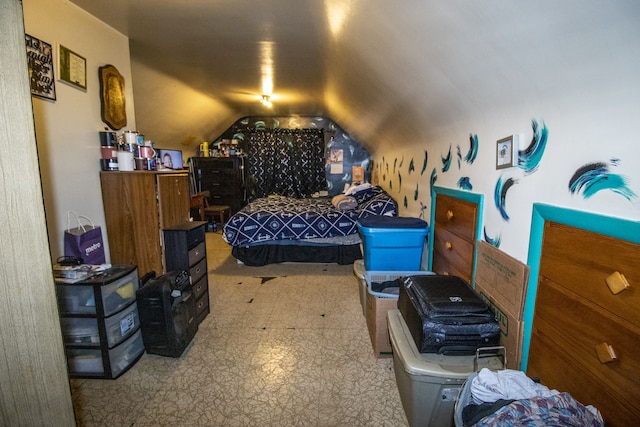 bedroom featuring lofted ceiling