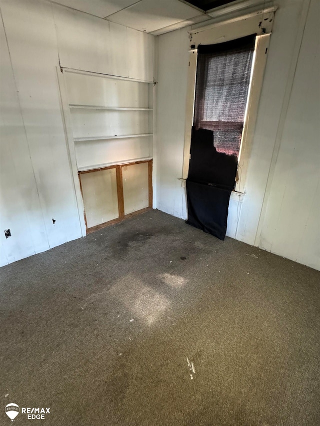 unfurnished living room with carpet floors