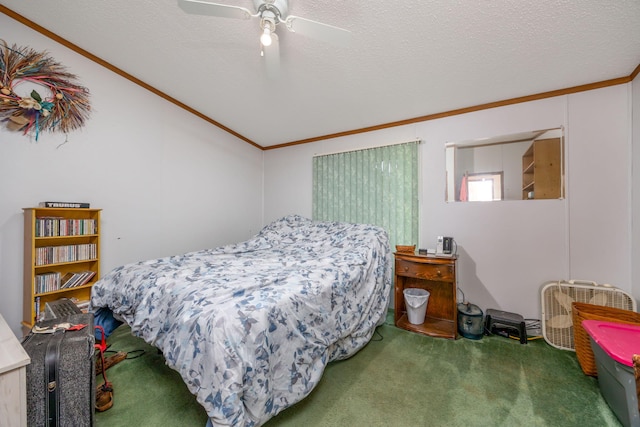 bedroom with ceiling fan, crown molding, carpet, and a textured ceiling