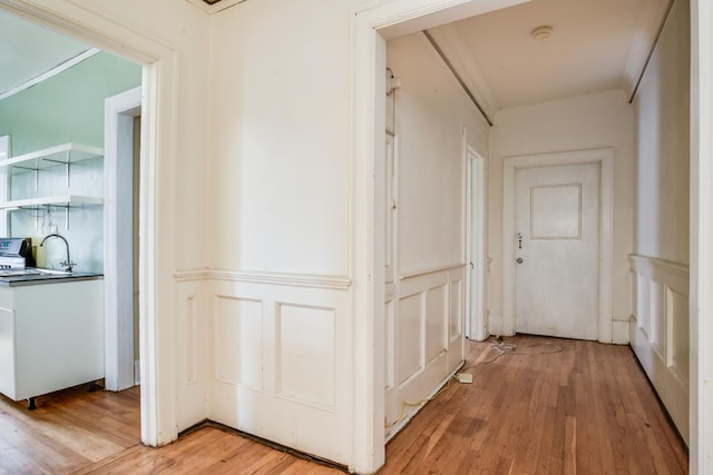 hall with light hardwood / wood-style floors