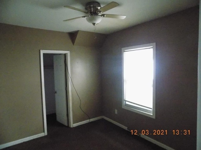 unfurnished room with ceiling fan