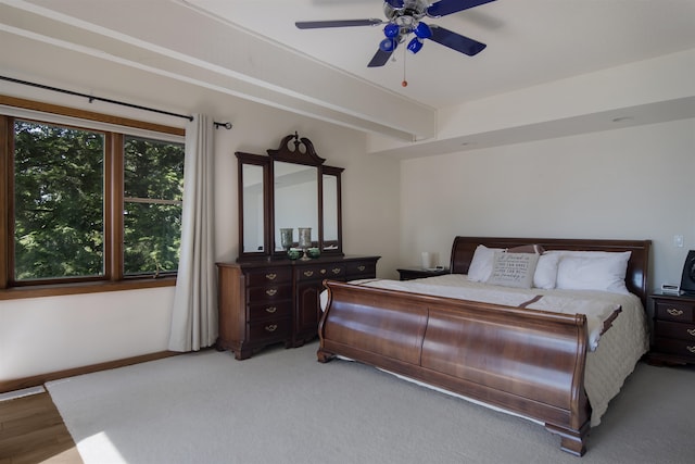 bedroom with light wood-type flooring and ceiling fan