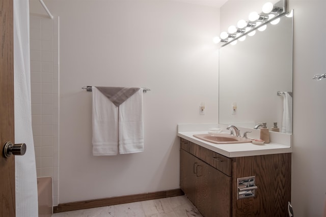 bathroom featuring vanity and shower / tub combo with curtain