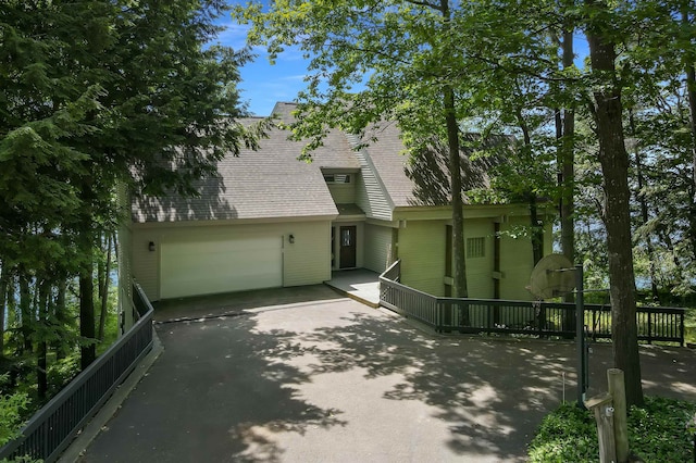 exterior space with a garage