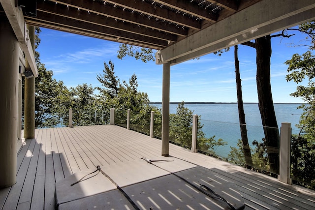 wooden terrace with a water view