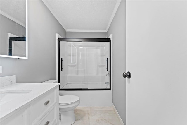 full bathroom with vanity, crown molding, bath / shower combo with glass door, toilet, and a textured ceiling