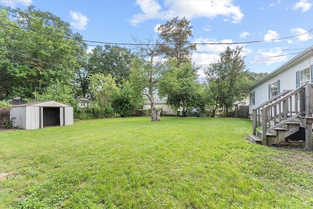 view of yard featuring a storage unit