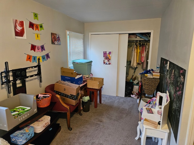 carpeted bedroom with a closet