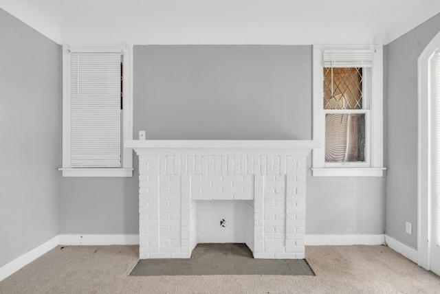 details featuring carpet and a brick fireplace