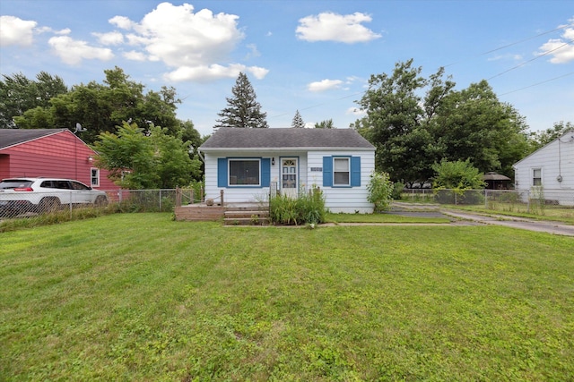 view of front of home with a front yard