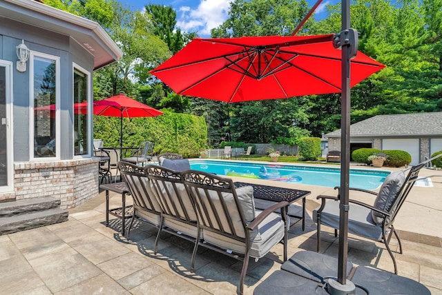 view of swimming pool featuring a patio and outdoor lounge area