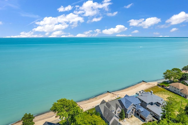 aerial view with a beach view and a water view