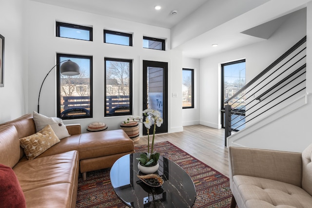 living room with light hardwood / wood-style flooring