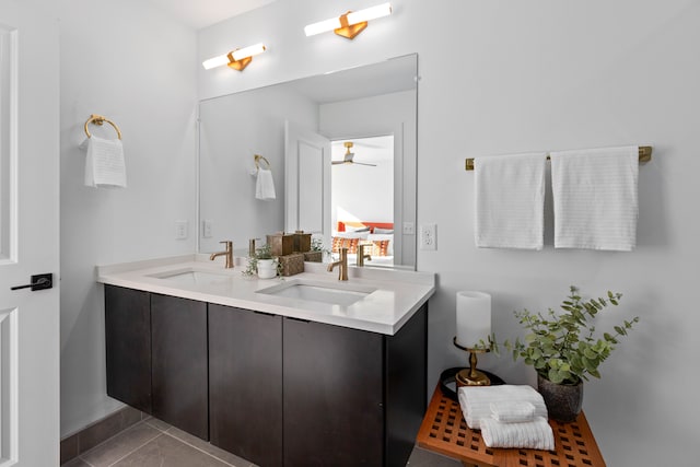 bathroom with tile patterned floors and vanity