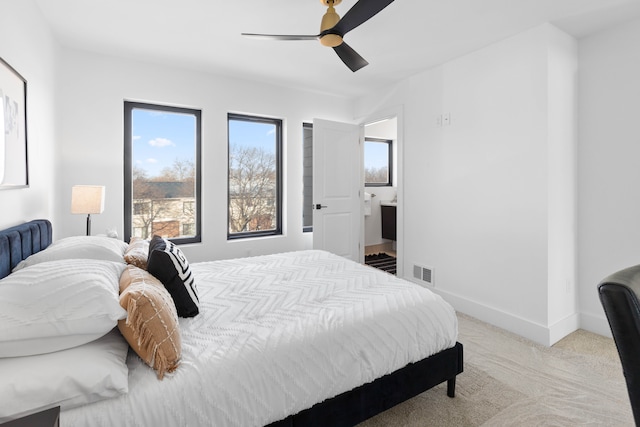 carpeted bedroom featuring ceiling fan