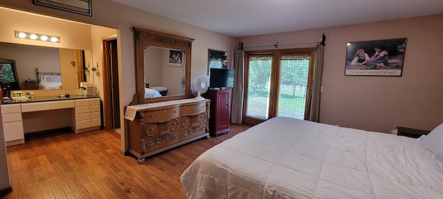 bedroom with light wood-type flooring