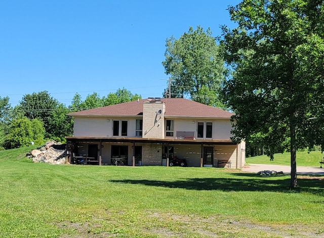 back of house with a yard