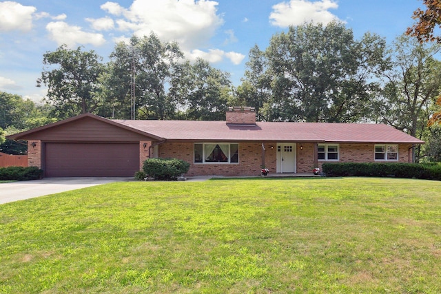 single story home with a garage and a front lawn