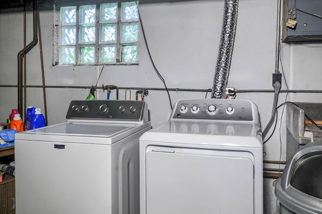 laundry room featuring separate washer and dryer