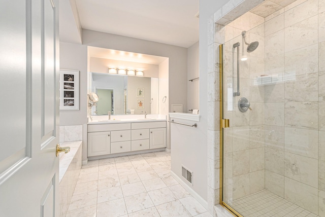 bathroom featuring vanity and plus walk in shower