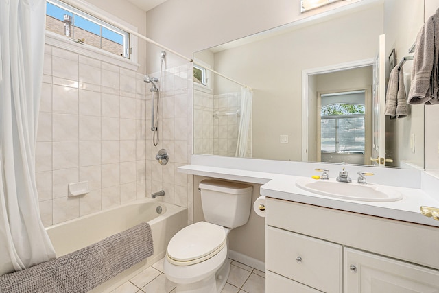 full bathroom with tile patterned flooring, vanity, a healthy amount of sunlight, and shower / tub combo with curtain