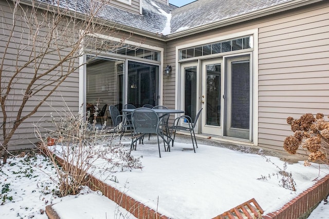 view of snow covered patio