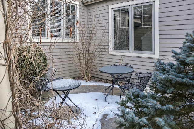 view of snow covered patio