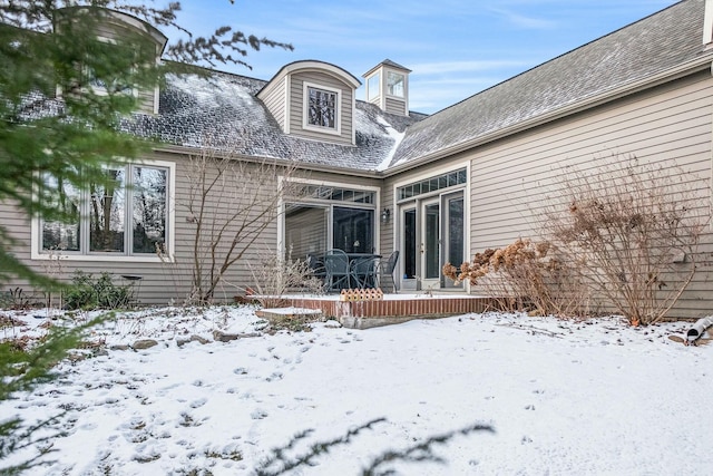 view of snow covered property