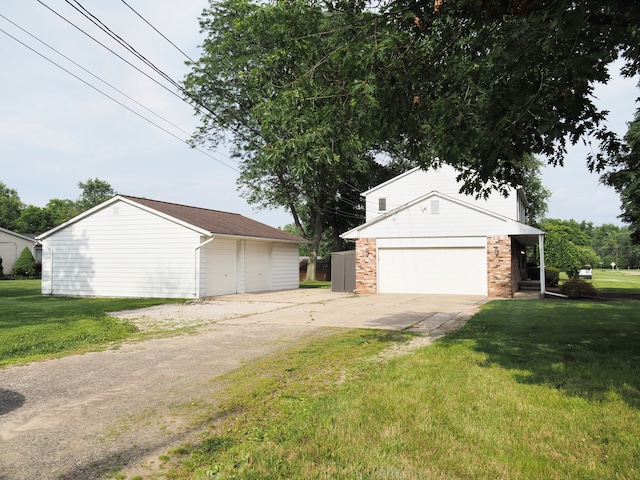 exterior space featuring a yard and an outdoor structure