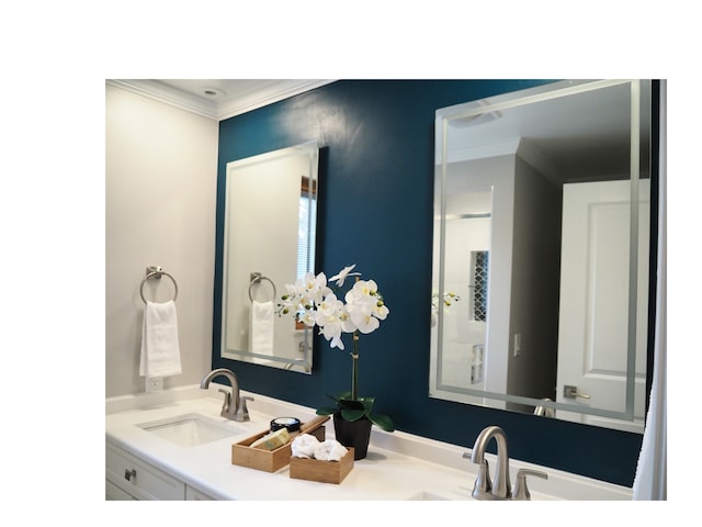 bathroom featuring vanity and crown molding