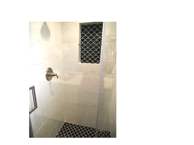 room details with a tile shower