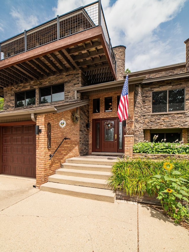 entrance to property featuring a garage