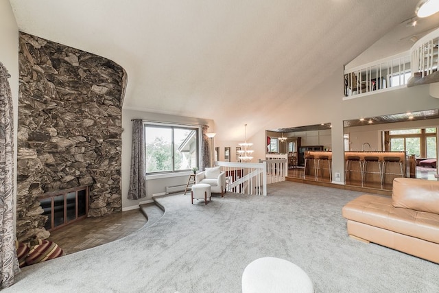 living room featuring a fireplace, carpet, a baseboard radiator, and high vaulted ceiling