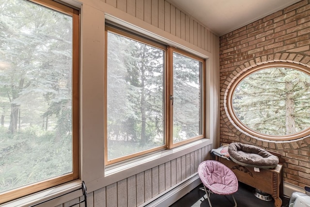 sunroom / solarium featuring a wealth of natural light