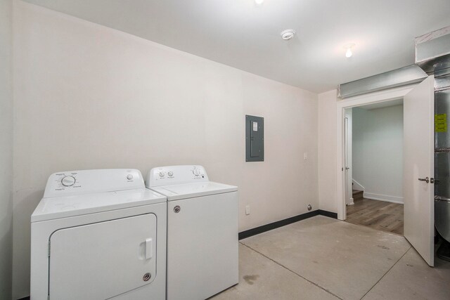 laundry area featuring washer and clothes dryer and electric panel