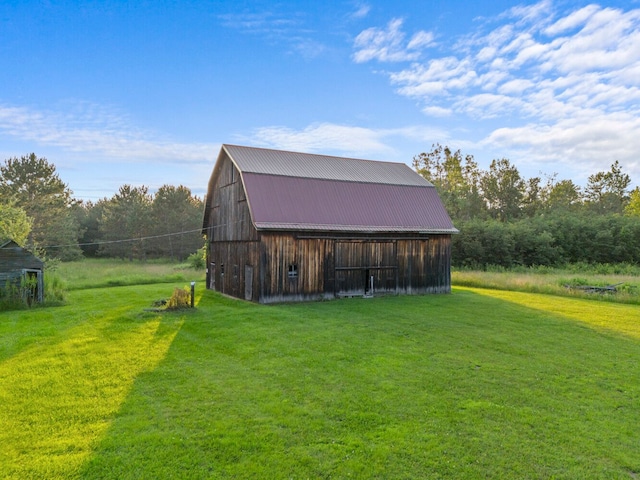 view of outdoor structure featuring a yard