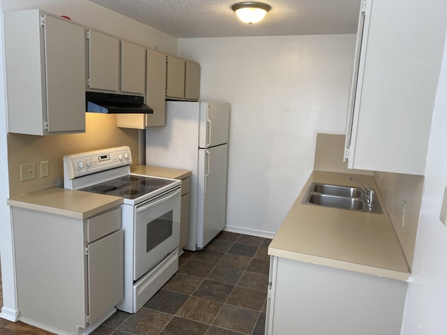 kitchen with white range with electric cooktop, sink, and a textured ceiling