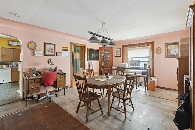 dining room with light hardwood / wood-style floors